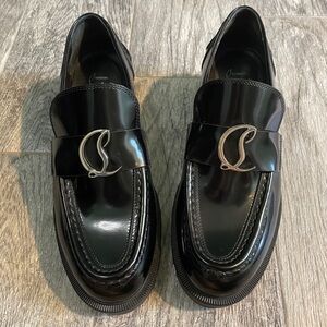 Christian Louboutin Patent Medallion Red Sole Loafers
Size 37
